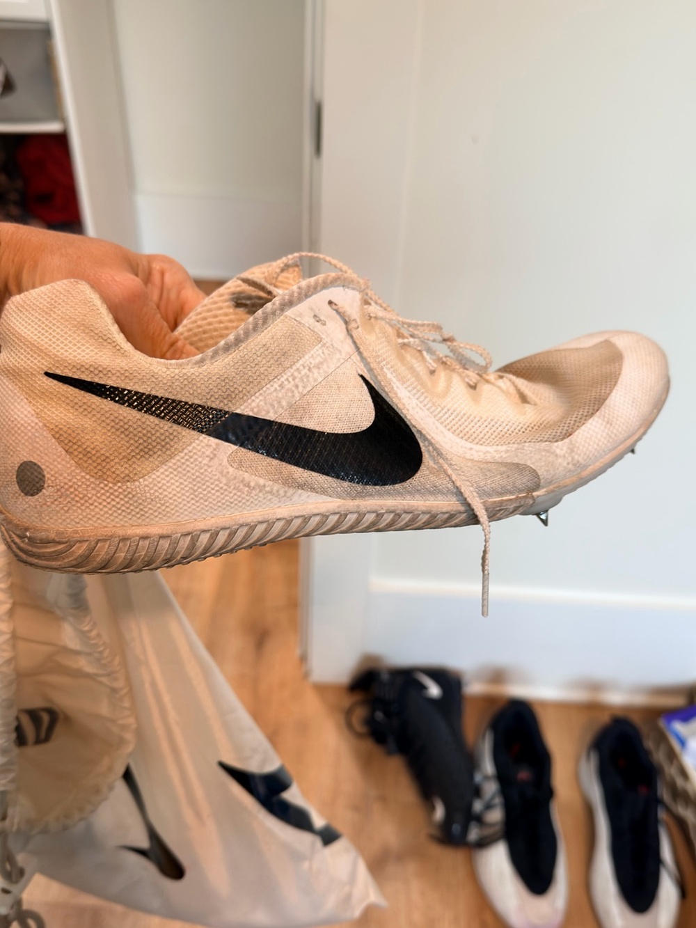 Nike Men’s White Athletic Track Spikes with Black Swoosh